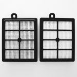 Two identical square-shaped, black-framed HEPA filters are presented side by side against a white background. Each filter features a symmetrical grid design with white pleated filter media, indicating they are clean and unused. The simple, minimalist presentation emphasizes the filters' functionality and cleanliness.