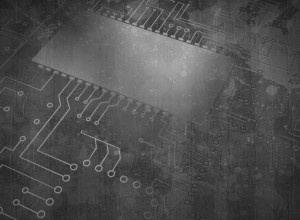 Abstract image of a gray, grunge-styled circuit board pattern with faint, splattered textures. The design includes thin lines and circular connection points, resembling electronic pathways. A large, blurred rectangular area suggests the presence of a central microchip. The image is meant to convey the idea of melding technology in the creation of 3D concrete.