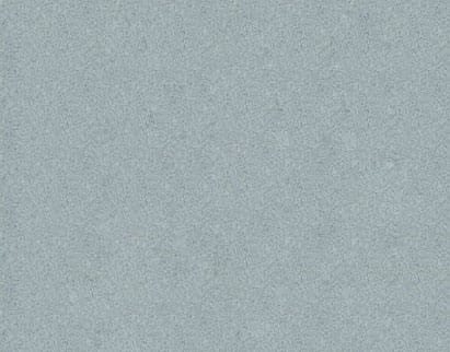 A close-up of a textured surface with a speckled pattern in shades of light blue and grey.