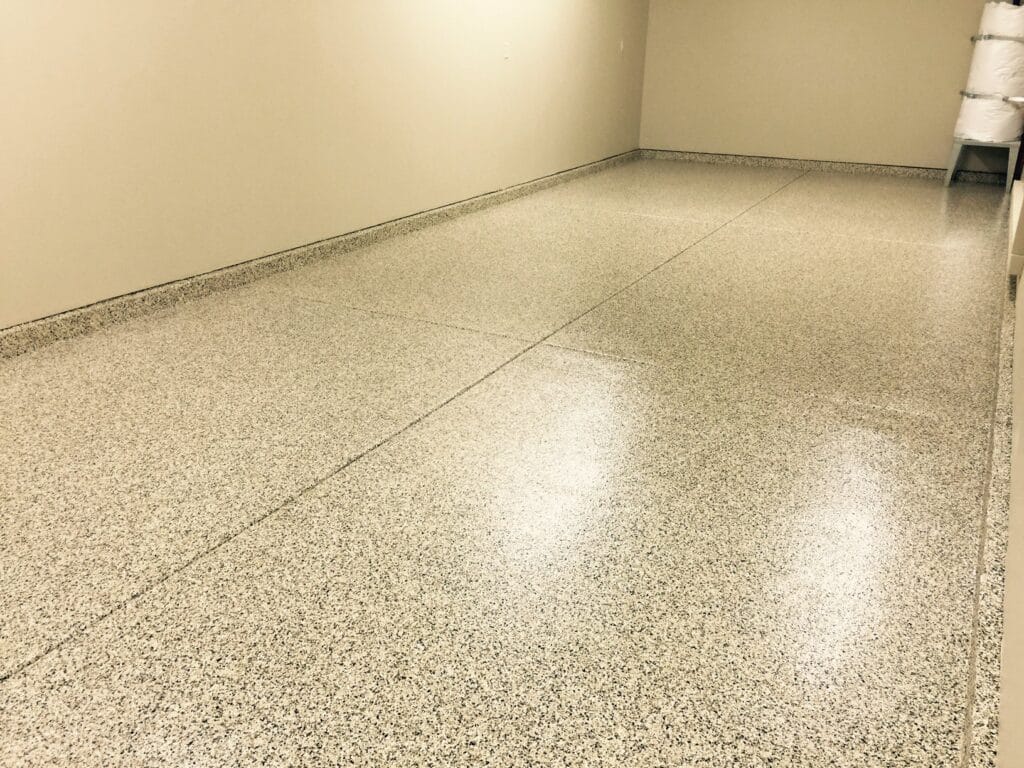 Sand Colored Epoxy Garage Slabs With Small Flakes