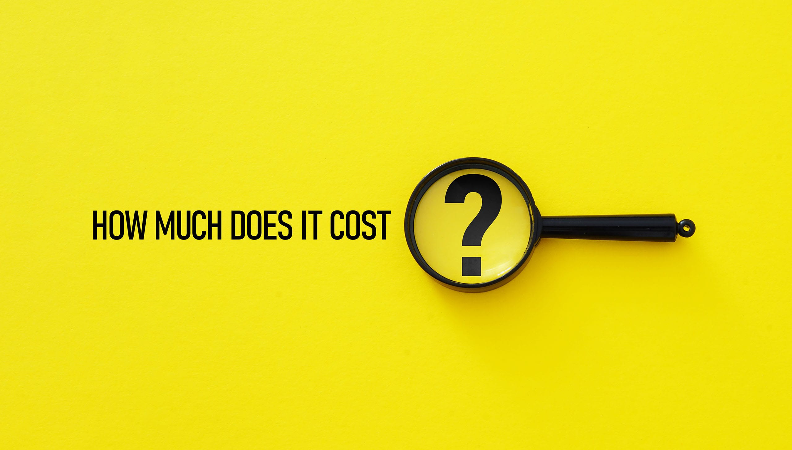 Bold text “How much does it cost” on a bright yellow background beside a magnifying glass highlighting a question mark, symbolizing pricing inquiry